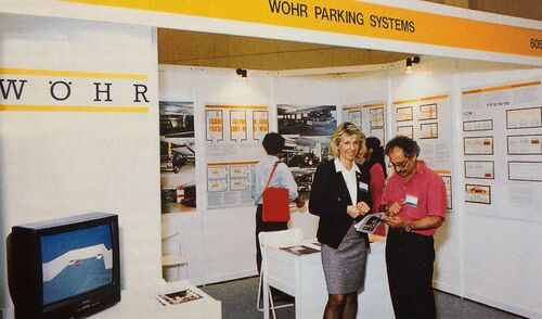 WÖHR exhibition stand with two people in conversation