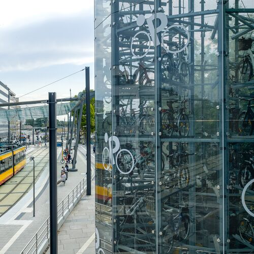 Close-up of an automatic parking system with parked bikes