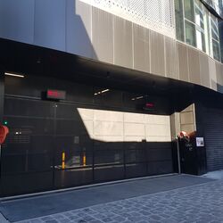 The entrance to the parking system is secured with a gate.