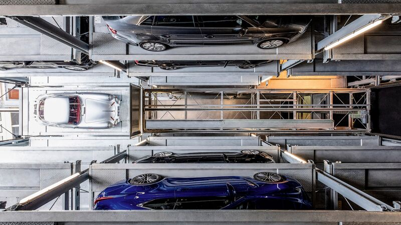Interior view of the parking system with a sports car parked inside